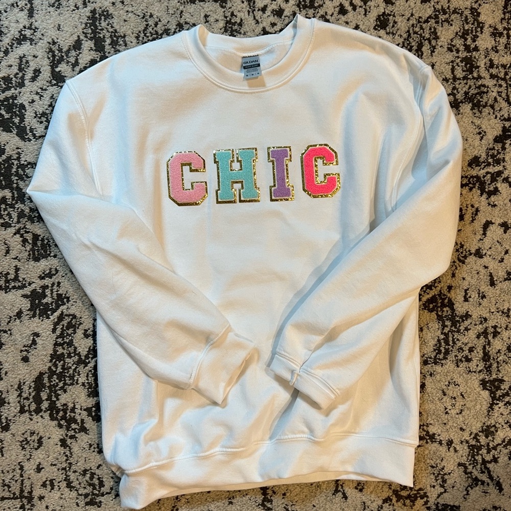 Judith March sweatshirt. Never worn. Size Medium.